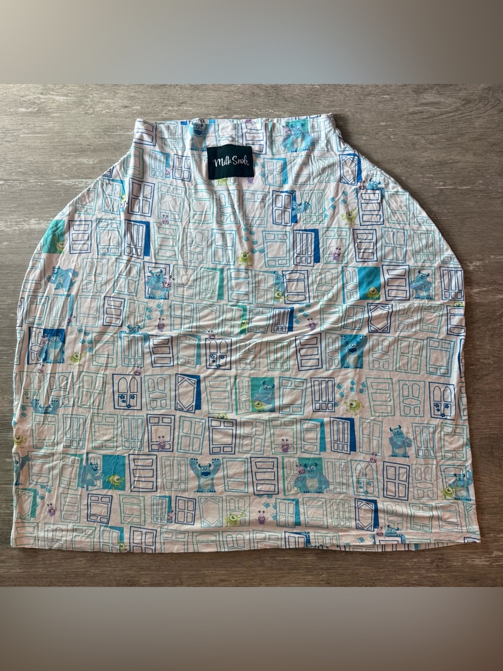 Milk Snob 5-in-1 cover in Disney Monsters Inc Doors print EUC nursing cover
